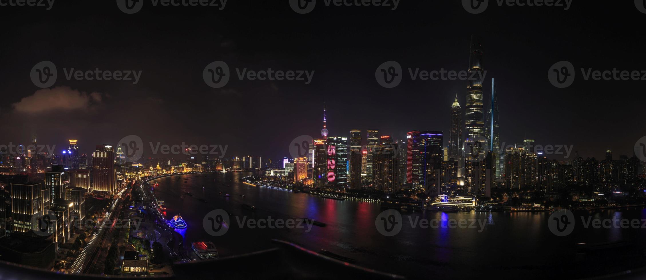 Panoramic areal view on the Bund in Shanghai at night in summer photo