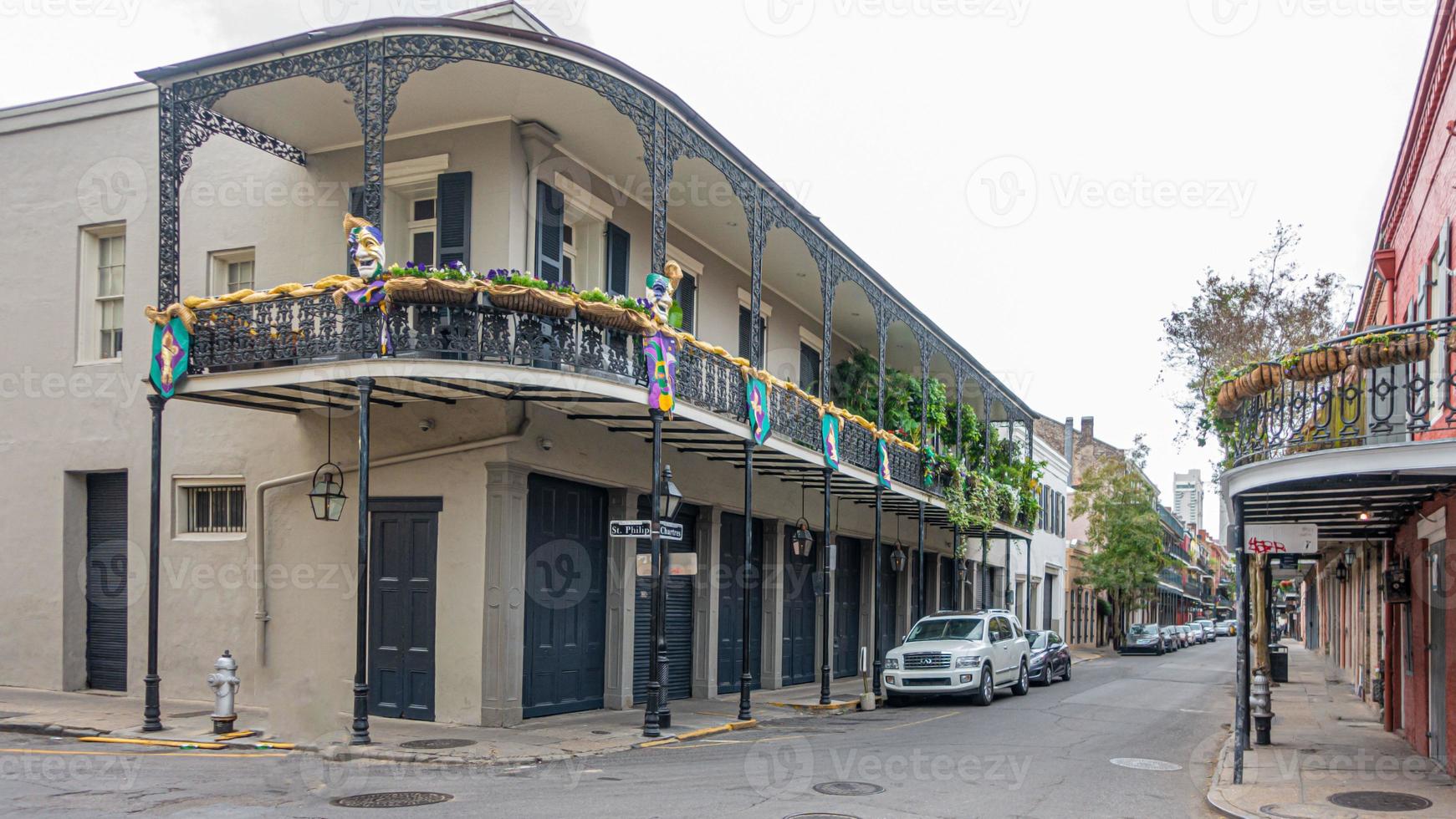 Typical street of houses in the historic French quarter of New Orlaeans during daytime photo