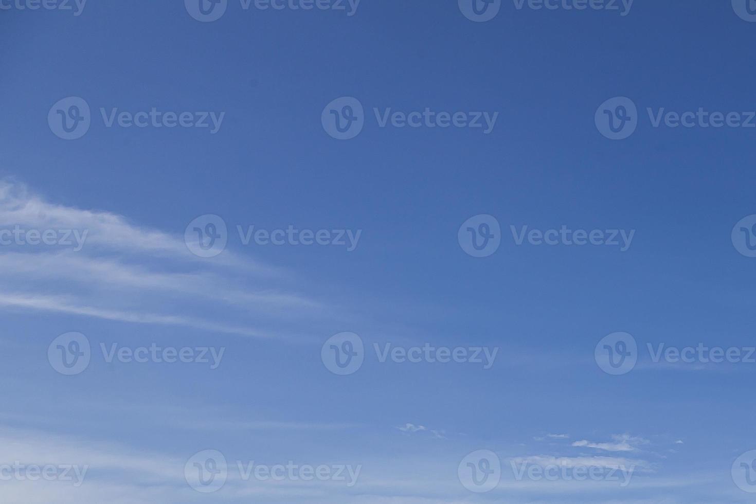 Image of a partly cloudy and partly clear sky during the day photo