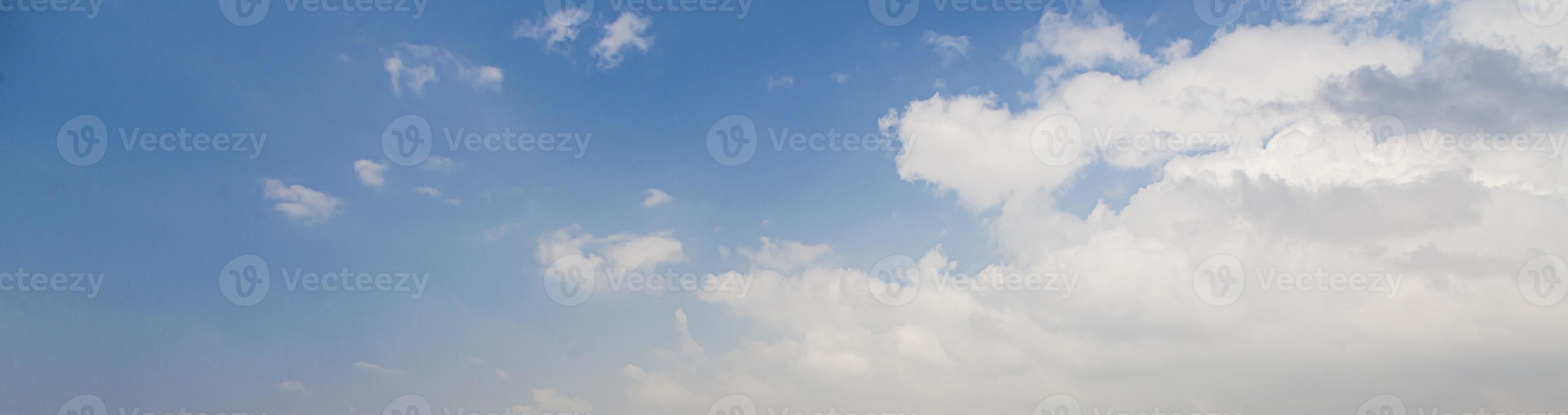 Image of a partly cloudy and partly clear sky during the day photo