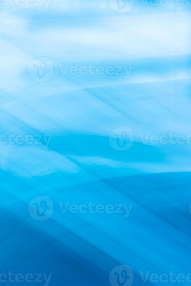 Blue vertical abstract background with lines crossing and gradient photo