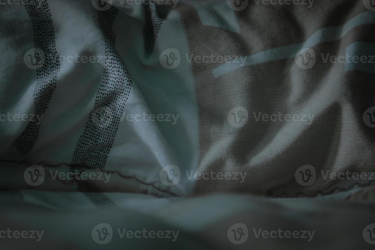 texture of a sleeping pillow before being made up in the morning photo