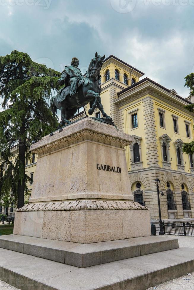 Monument of poet Dante Alighieri in the Piazza dei Signori in Verona, Italy photo