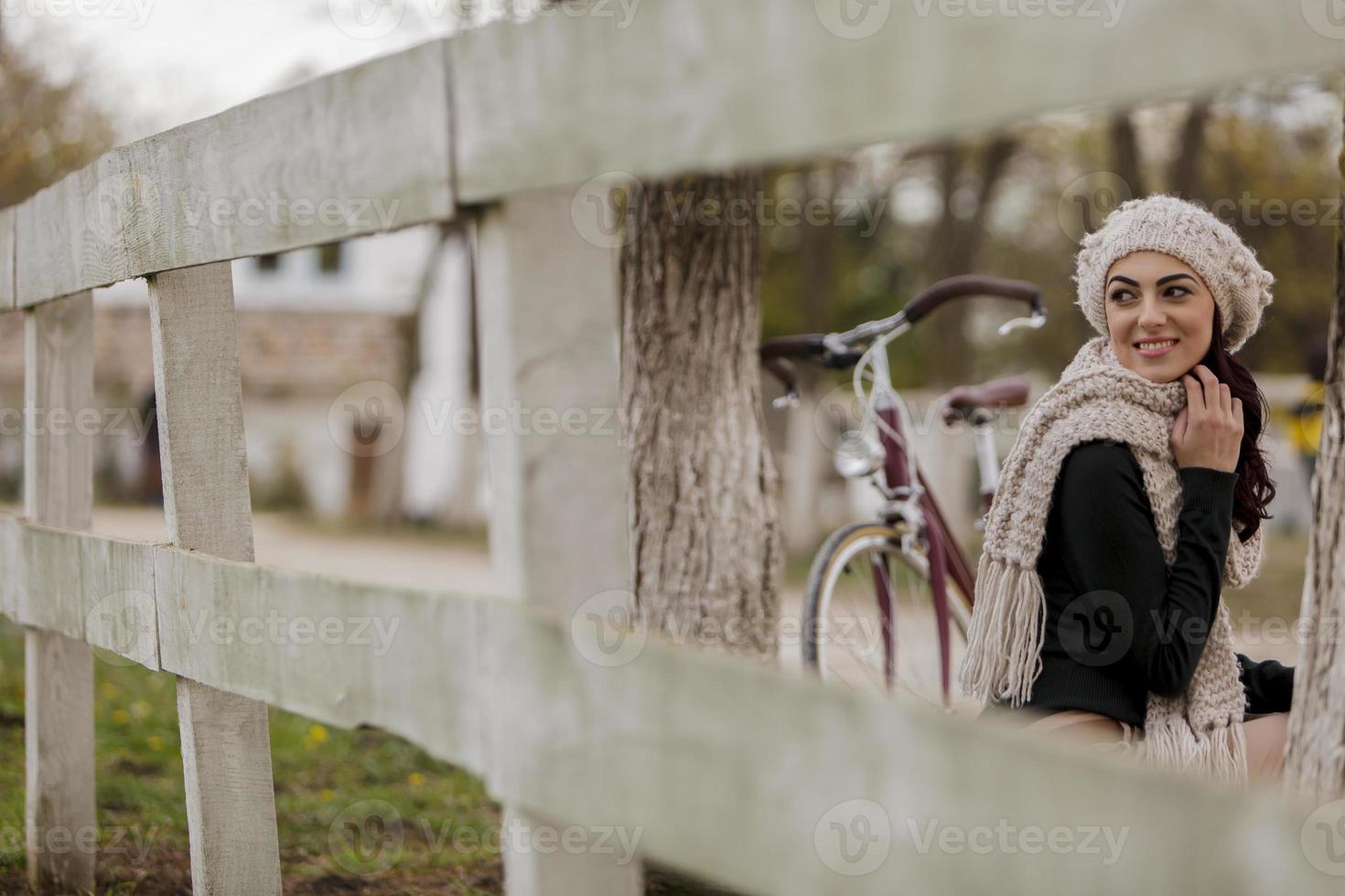 Young woman with a bicycle photo