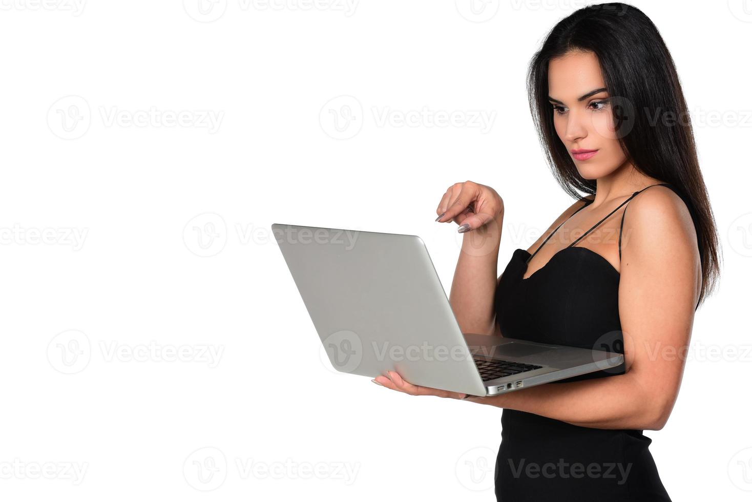 asian businesswoman working on laptop computer isolated over white background photo