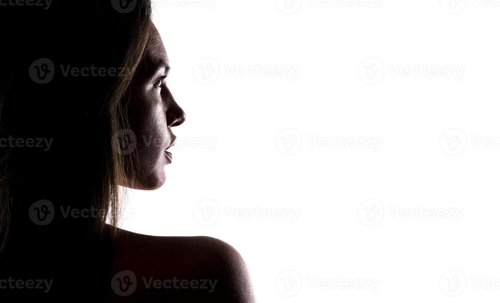 artistic view of depressed female model posing in studio photo