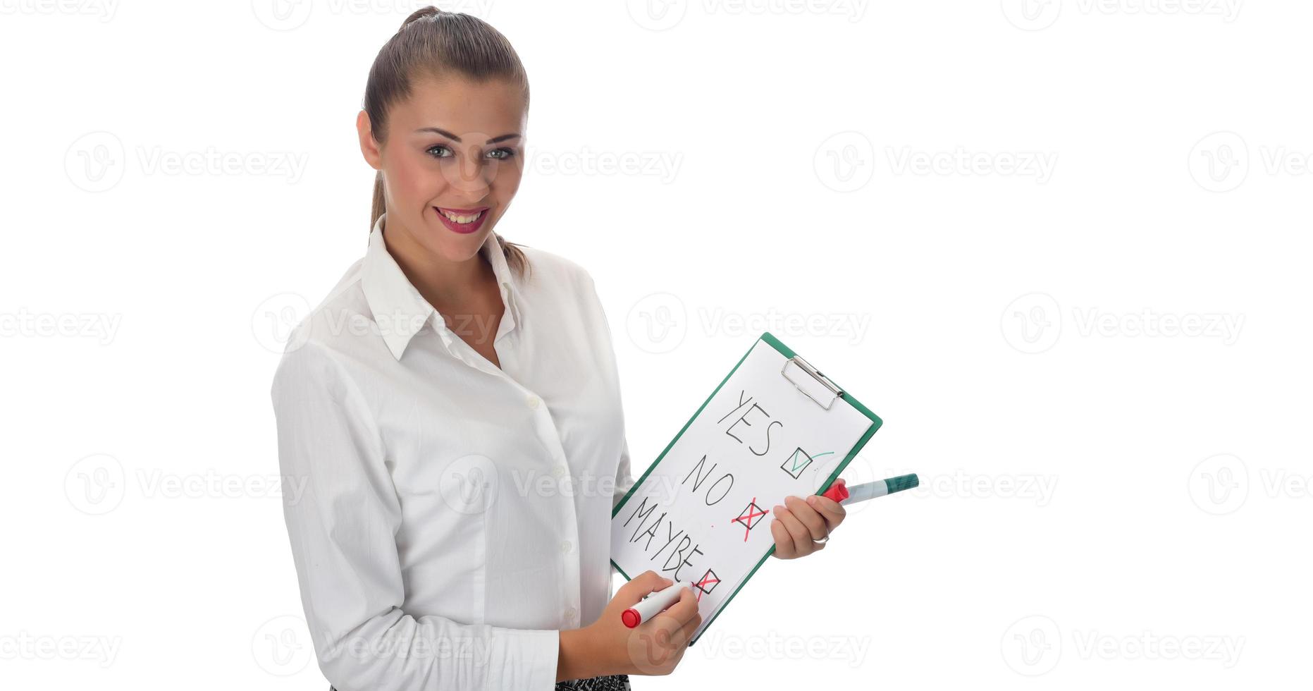 Happy young businesswoman doing business presentation at whiteboard, smiling, isolated on white background. photo