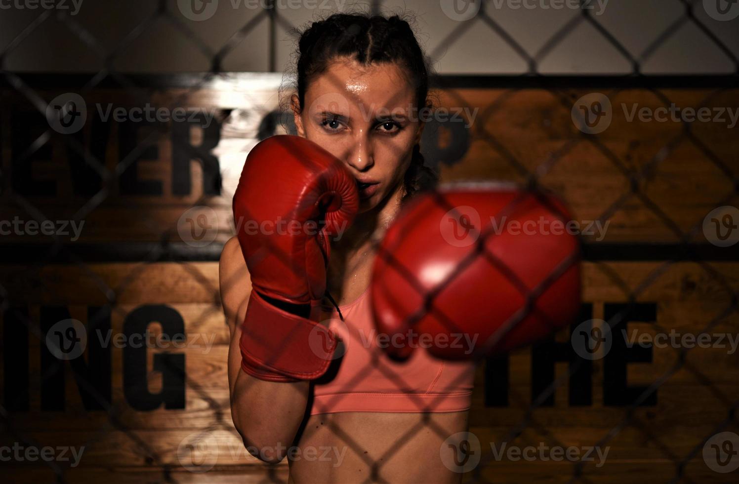 MMA woman fighter tough chick boxer punch pose pretty exercise training cross fit athlete photo