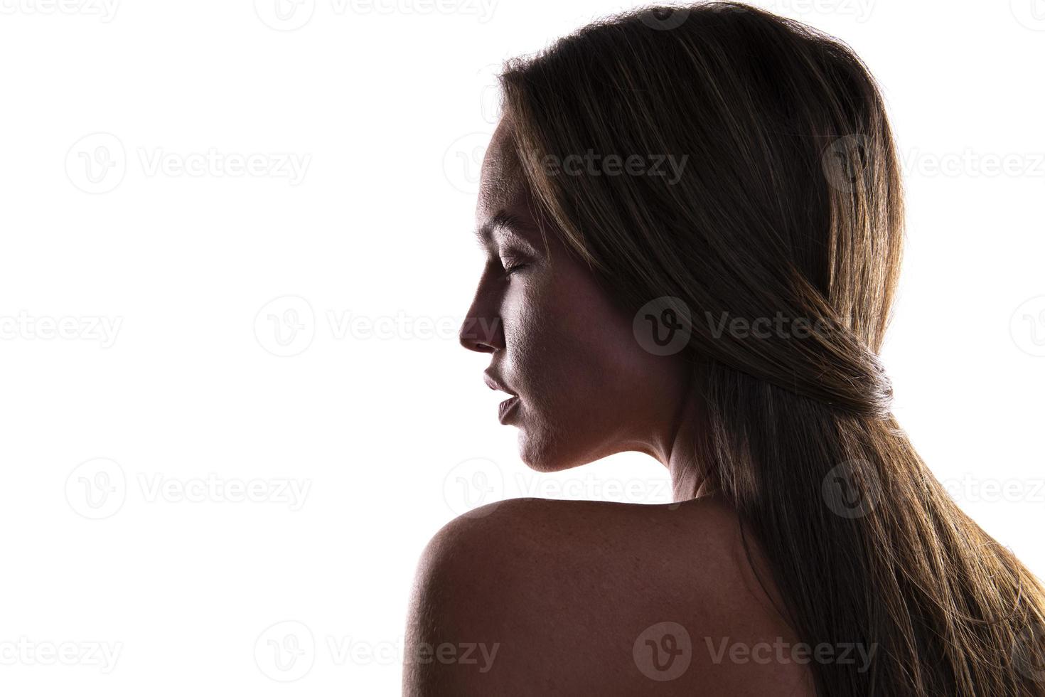 artistic view of depressed female model posing in studio photo