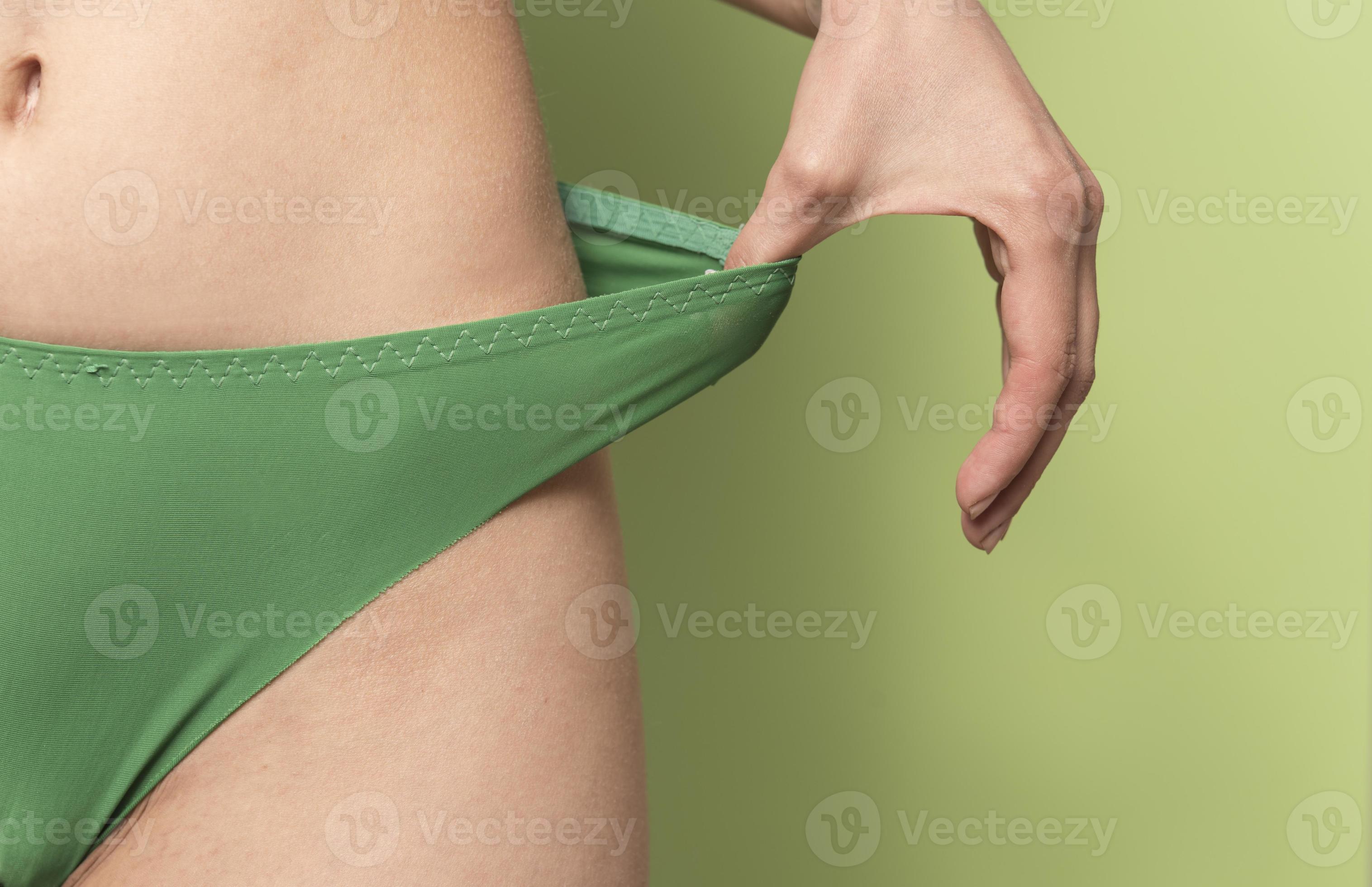 close-up view of nice unrecognized fit lady posing putting panties on  16605718 Stock Photo at Vecteezy