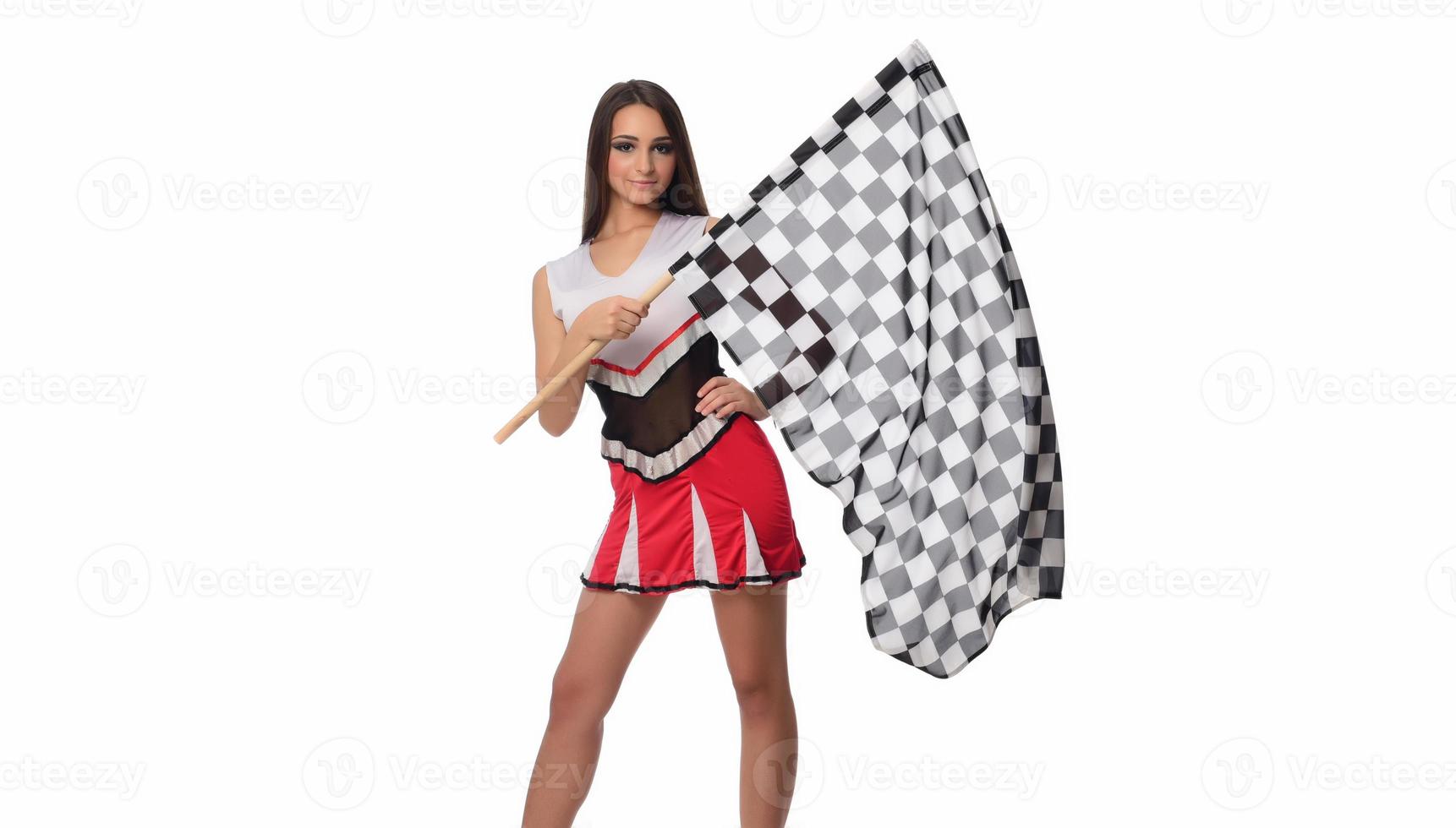 beautiful model holding finish flag isolated on white background. motorsport finish flag in hands female model. photo