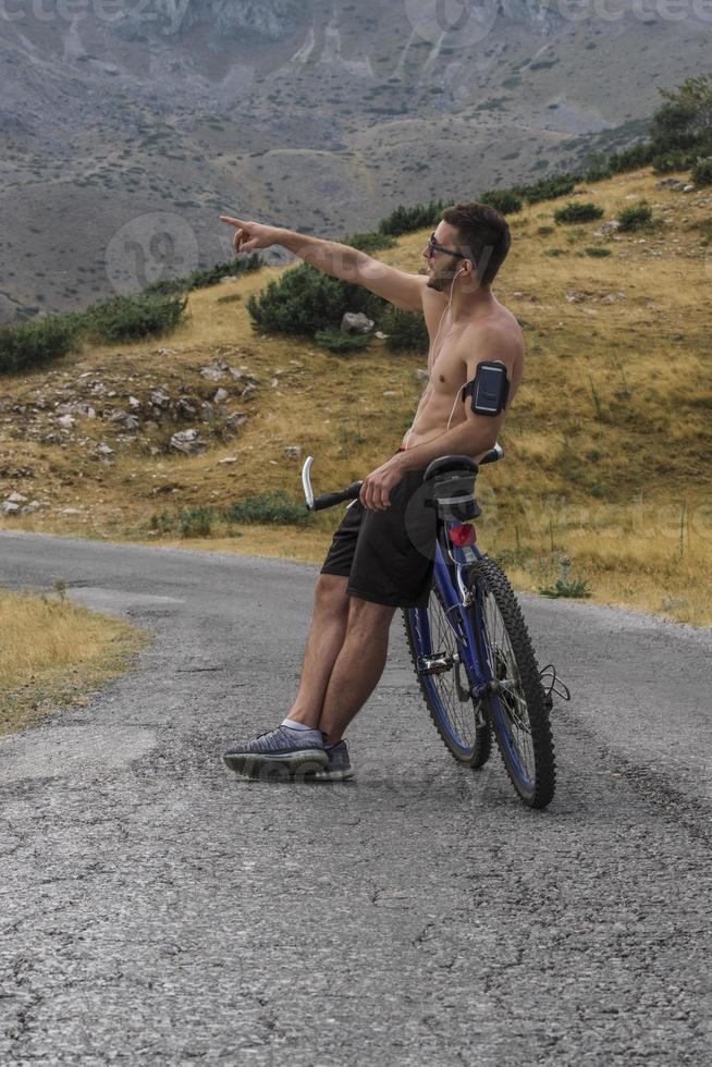 Extreme mountain bike sport athlete man riding outdoors lifestyle trail photo
