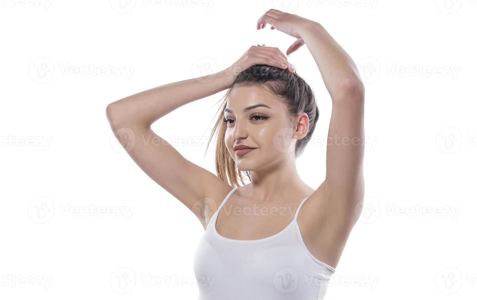portrait of happy girl who holds her hair photo