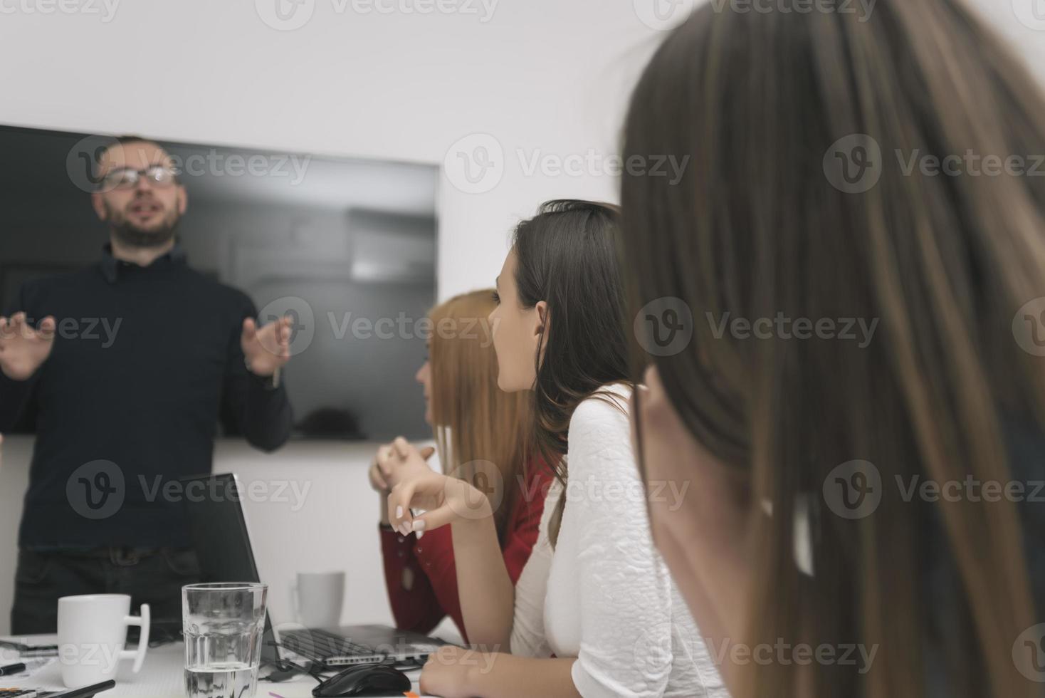 executive leader talking to happy diverse employees group at corporate office briefing, photo