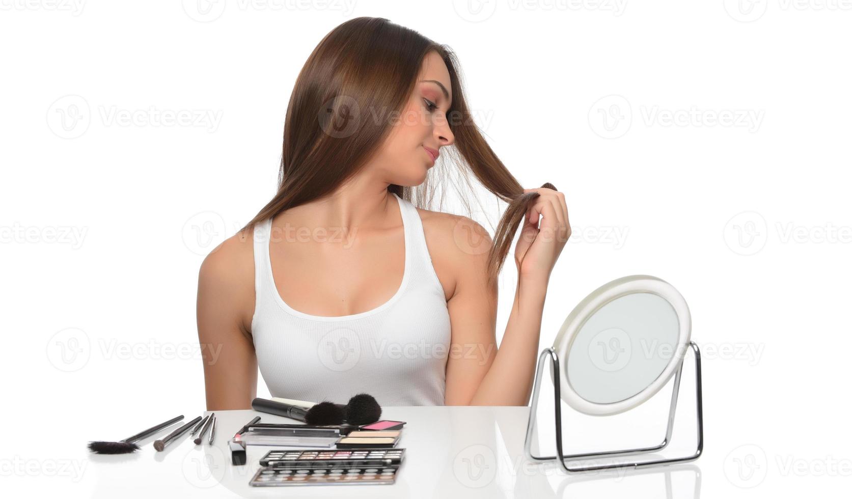 My hair regime has made my hair stronger. Studio shot of a young beautiful woman with long gorgeous hair posing photo