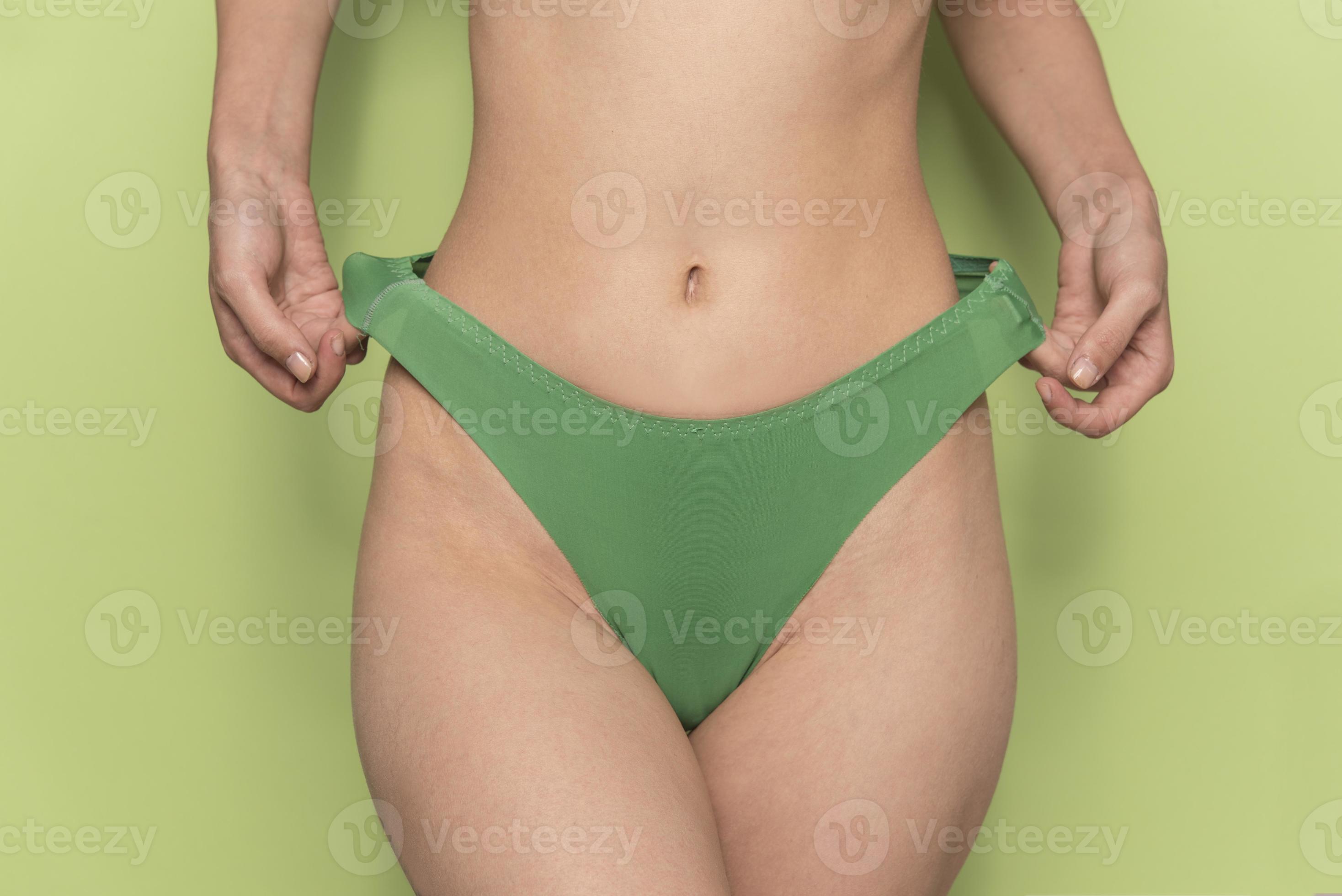 close-up view of nice unrecognized fit lady posing putting panties on  16606295 Stock Photo at Vecteezy