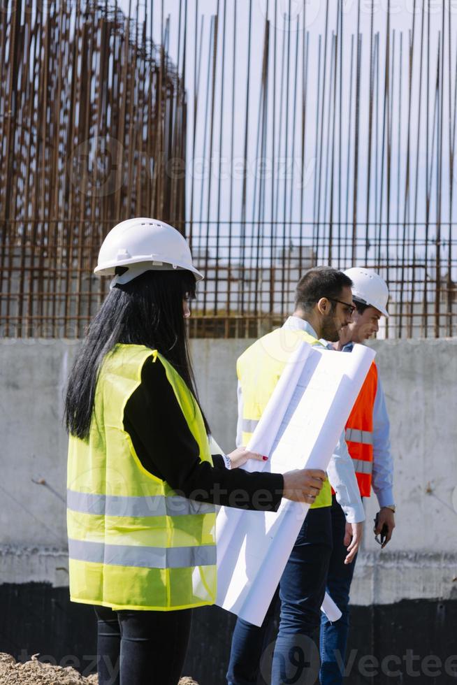 Construction team engineers speak to architects at construction sites or construction sites for high rise buildings, photo