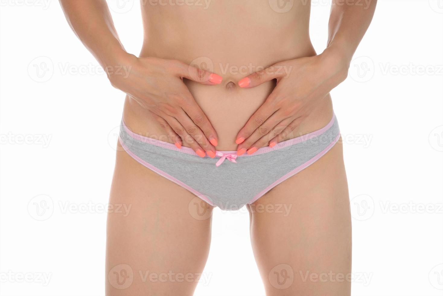 woman has pain in the genital area and ovarian. isolated photo