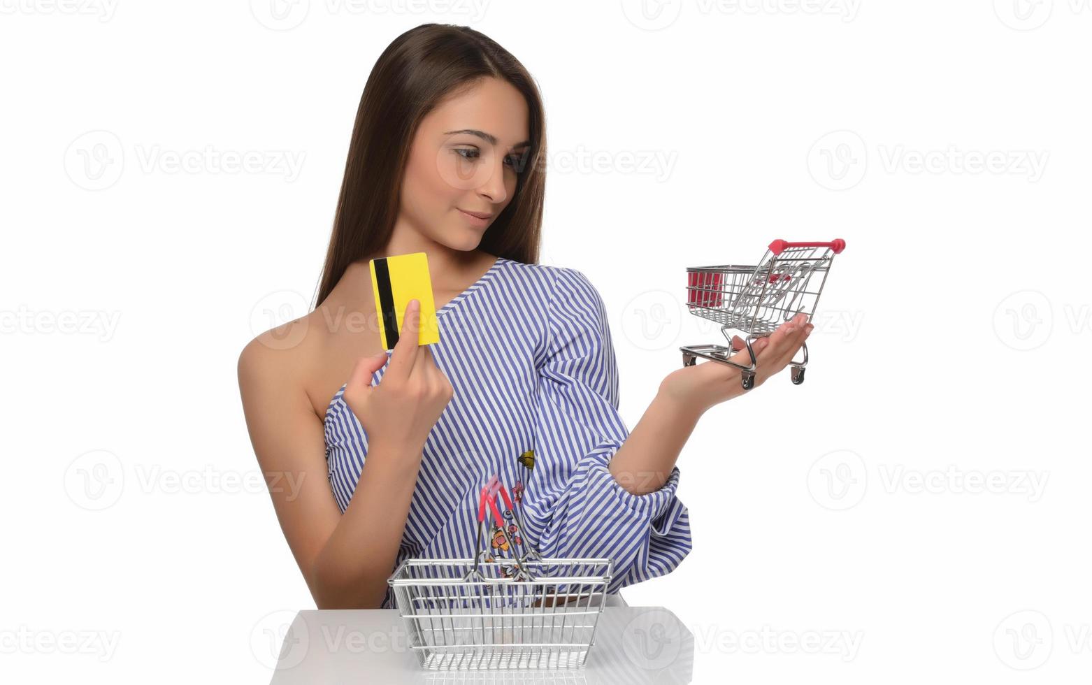 Young woman holding euro money isolated on white photo