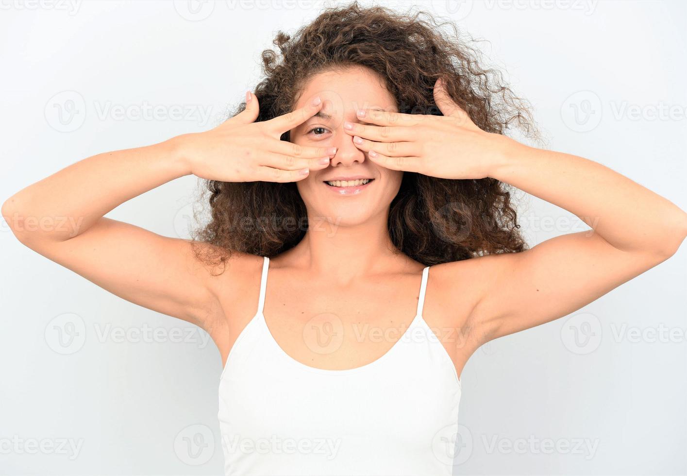 Photo of young girl amazed shocked afraid scared hands cover face eye look