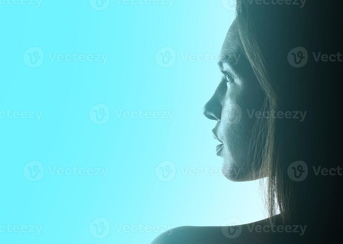 artistic view of depressed female model posing in studio photo