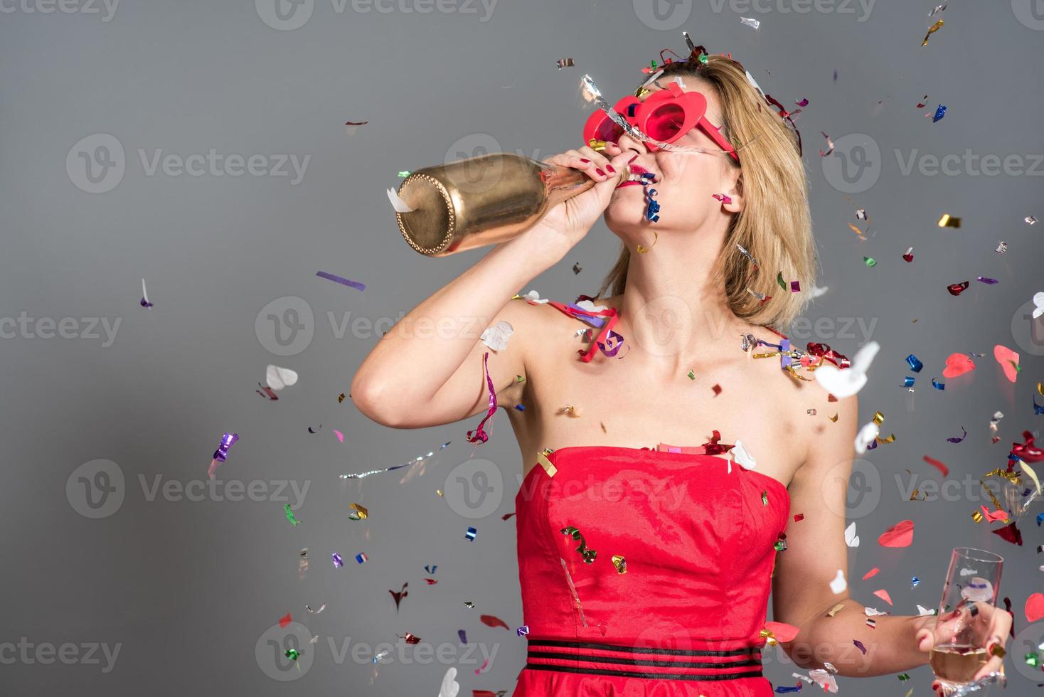 celebrating Christmas or New Year eve party with Bengal lights and rose champagne. photo