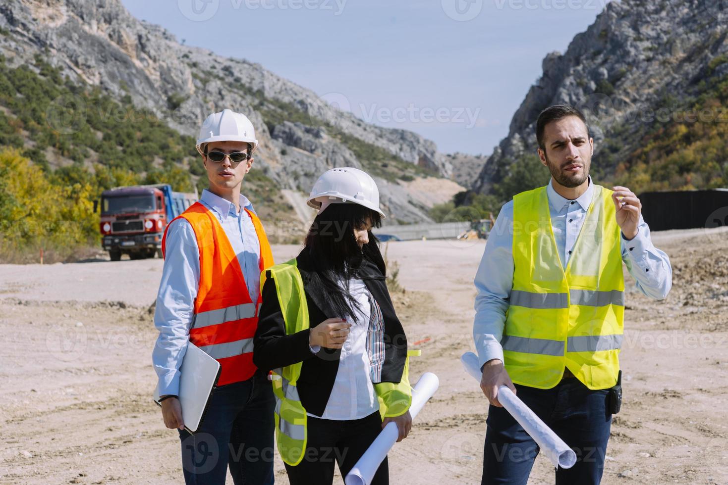 construction workers controlling explosion photo
