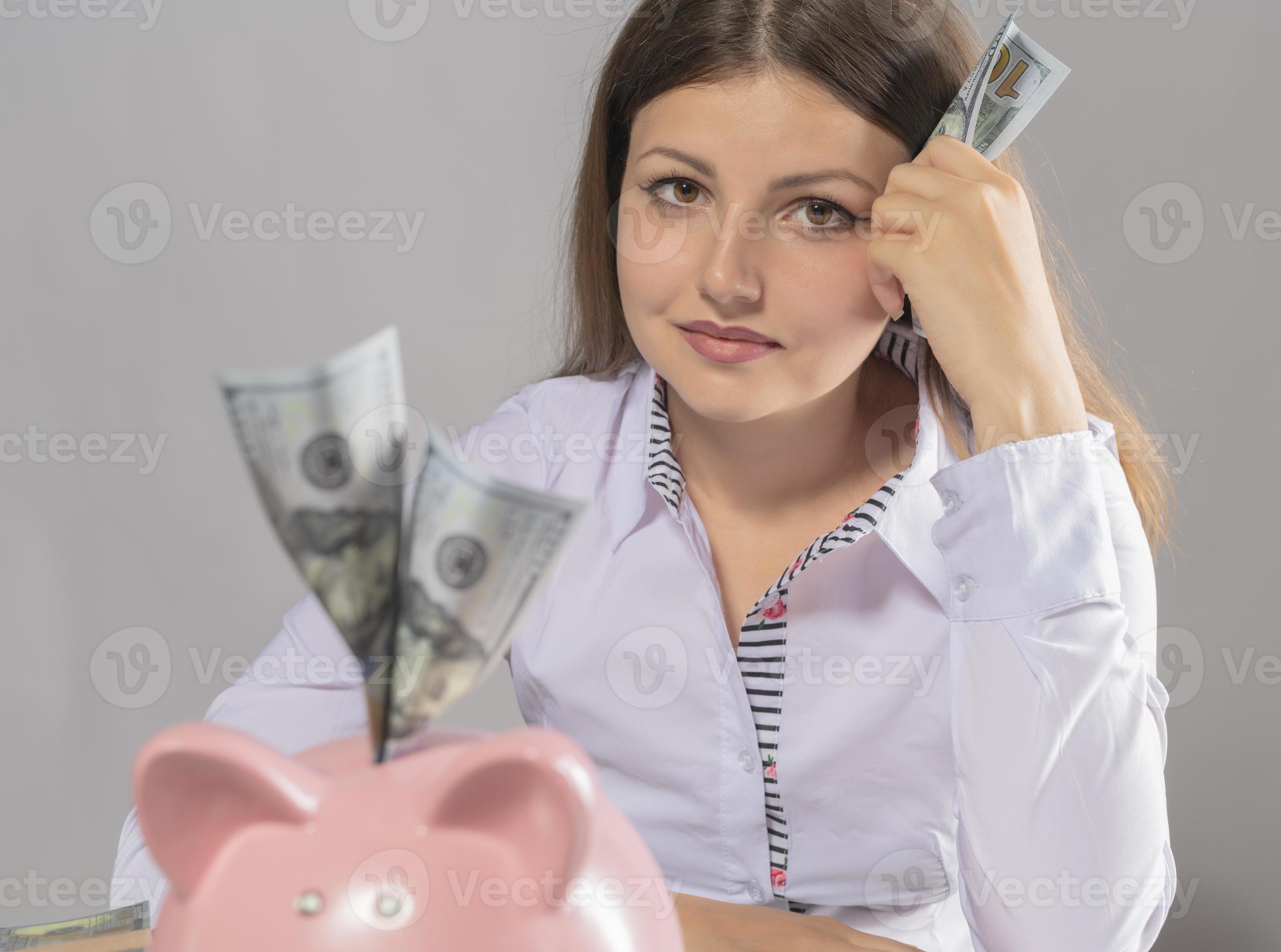 Woman Saving US Dollars In Piggy Bank 16607501 Stock Photo At Vecteezy woman-saving-us-dollars-in-piggy-bank-16607501-stock-photo-at-vecteezy