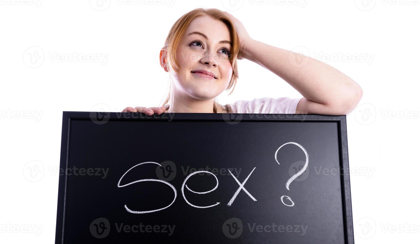 woman holding sex sign photo