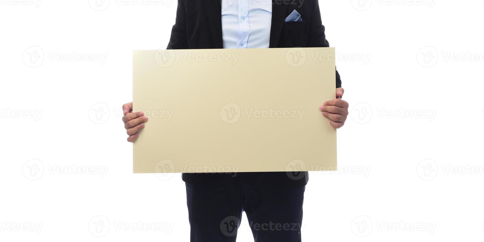 Arab businessman holding white board. advertisement concept. isolated photo