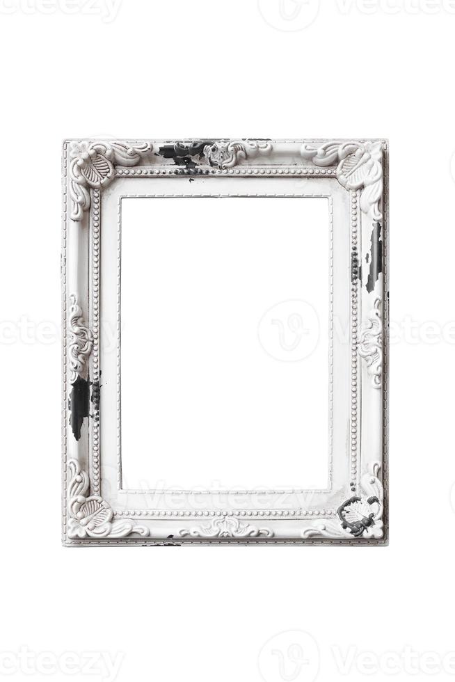 White, antique, vertical picture frame empty and isolated on white background. Old, vintage, decorative element with free space for your design or text. Frame mockup. photo