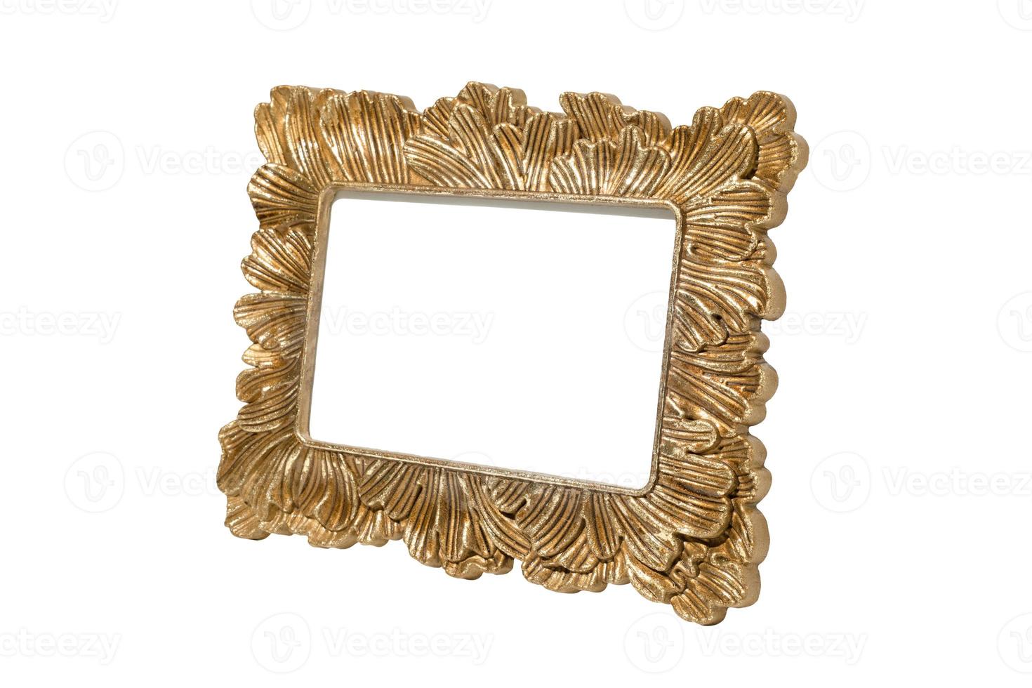 Golden picture frame empty and isolated on white background. Vintage, decorative element with free space for your design or text. Frame mockup. photo