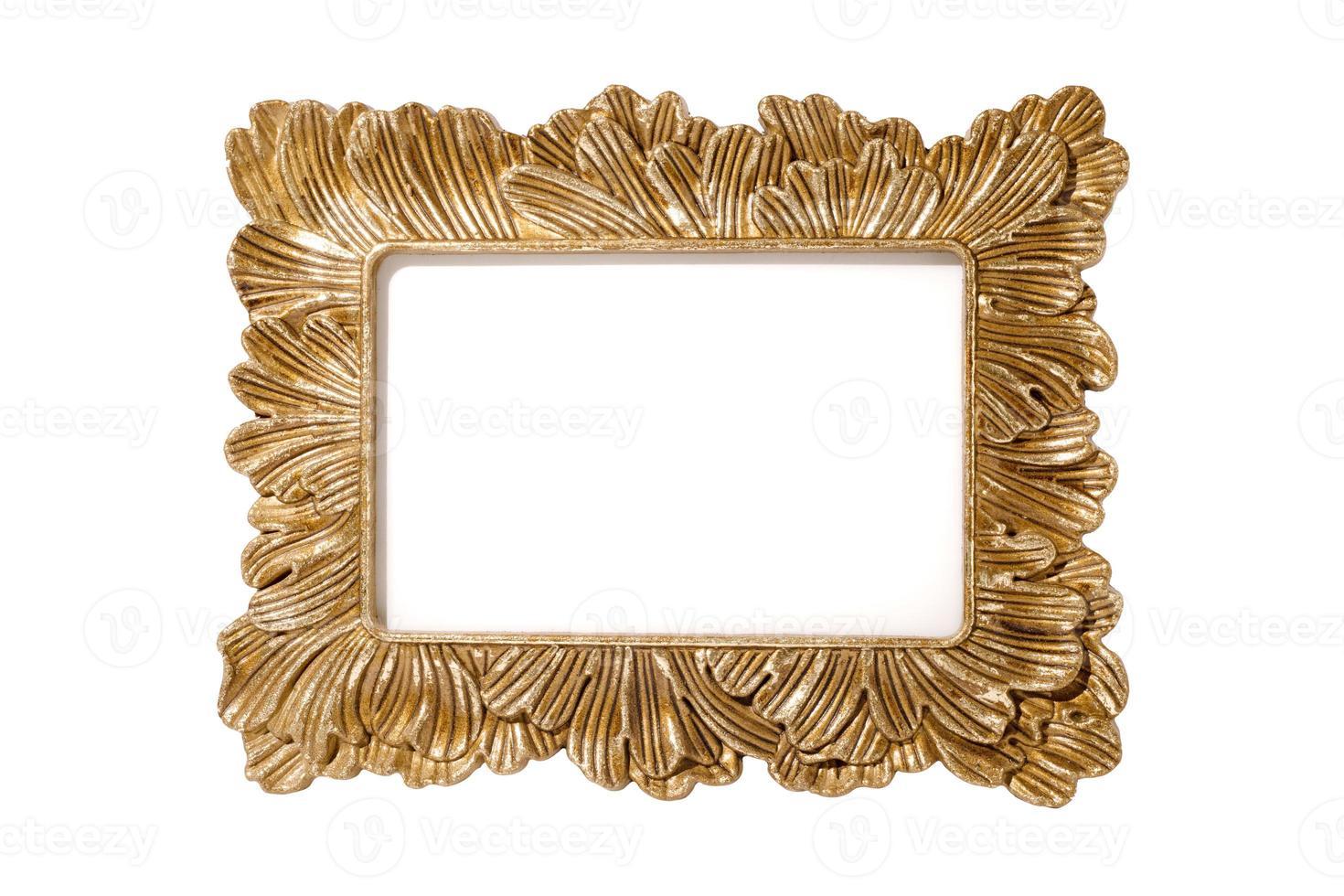 Golden picture frame empty and isolated on white background. Vintage, decorative element with free space for your design or text. Frame mockup. photo