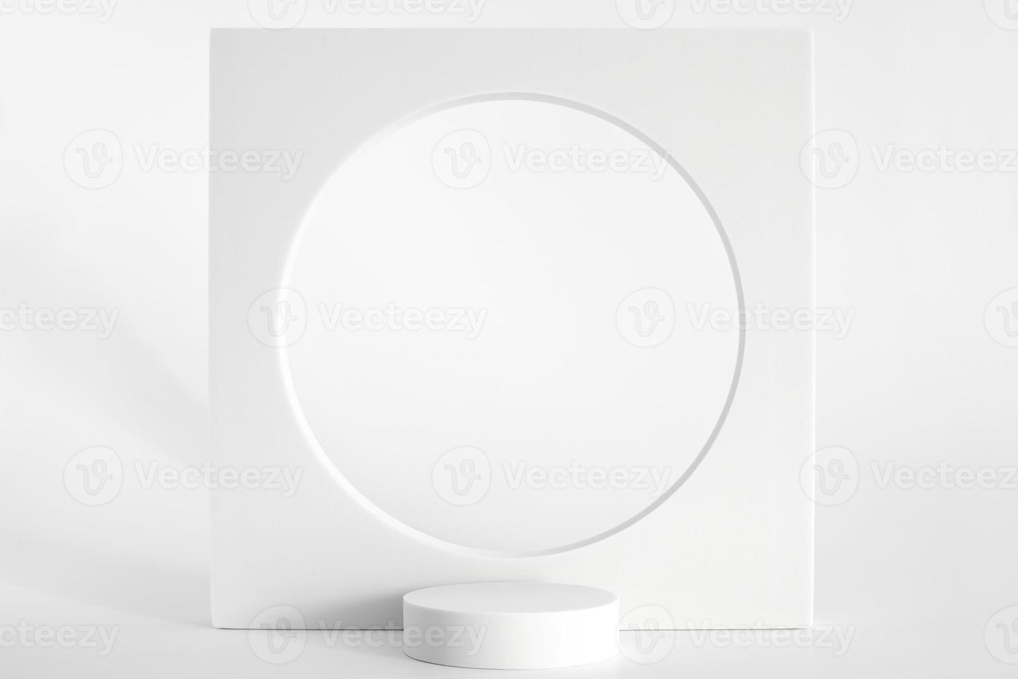 White podium on the white background, simple geometric forms. Podium for product, cosmetic presentation. Creative mock up. Pedestal or platform for beauty products. photo