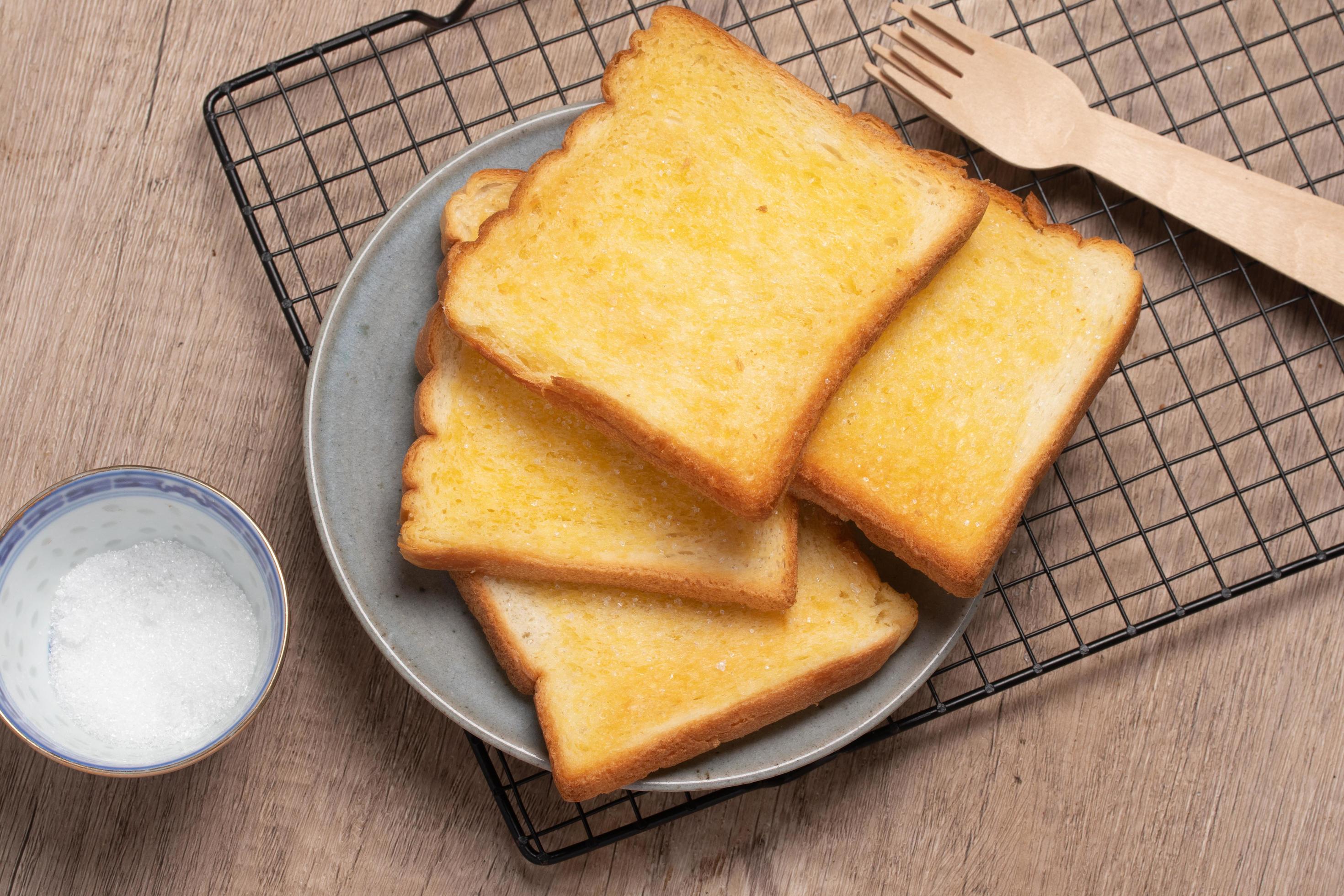 Crispy Toasted Bread with Butter and Sugar 16628701 Stock Photo at Vecteezy
