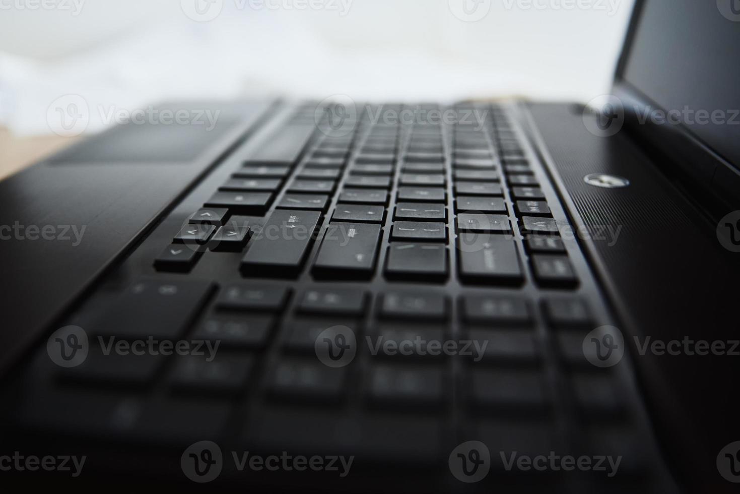 Laptop keyboard, close-up. Online working and education concept photo