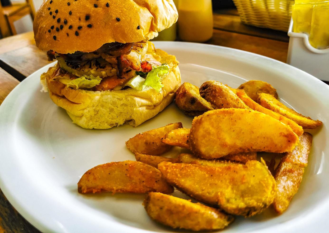 Fast food in the restaurant hamburger and fries in Mexico. photo