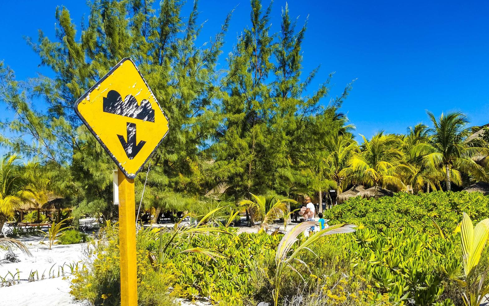 Traffic signs and road signs directional on Holbox island Mexico. photo