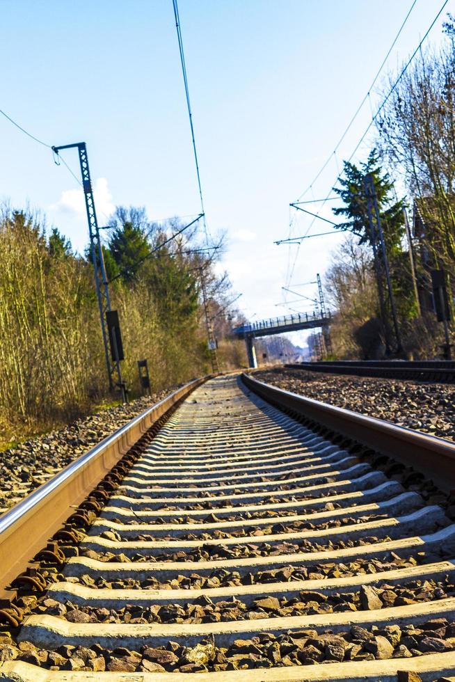 Train tracks through nature to infinity in Germany. photo