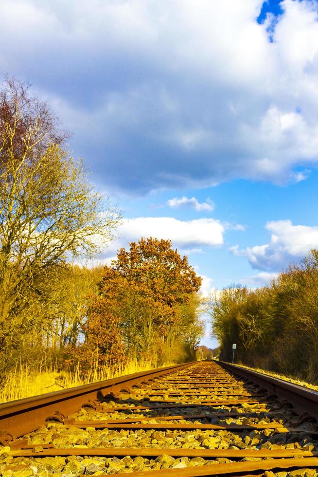 Train tracks through nature to infinity in Germany. photo