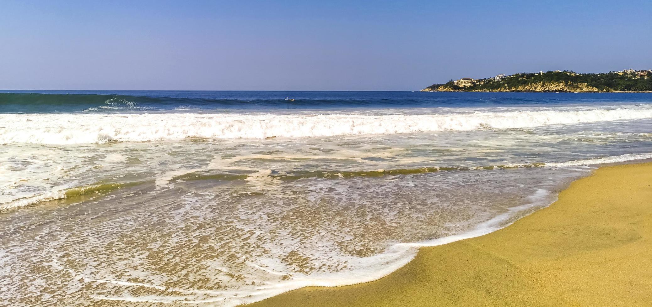 Extremely huge big surfer waves at beach Puerto Escondido Mexico. photo