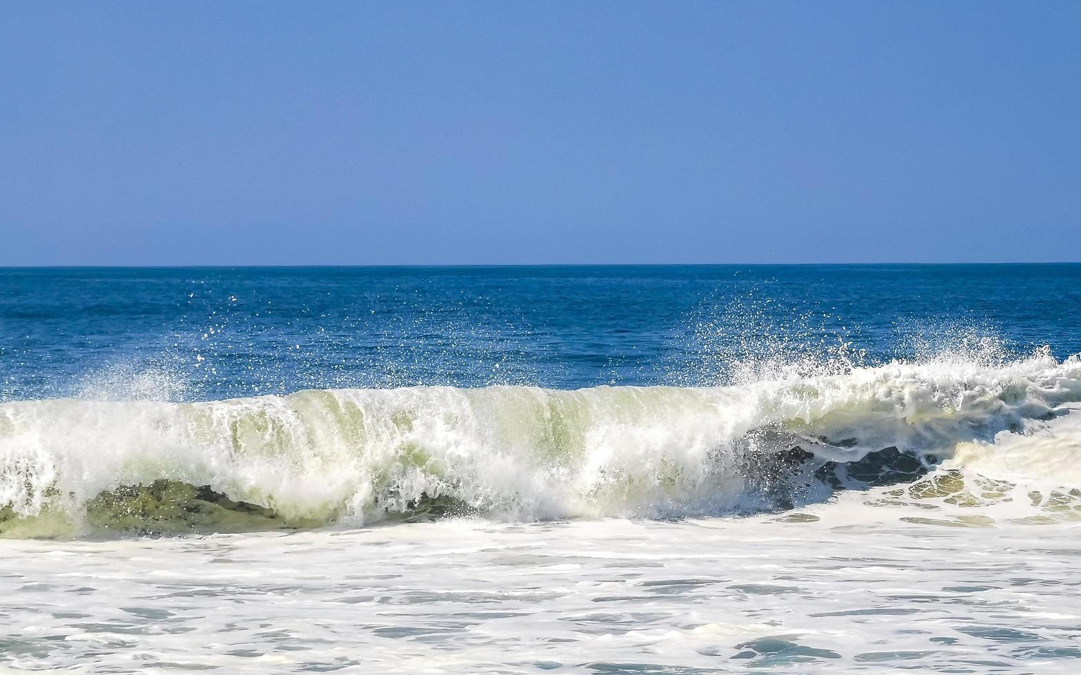 Extremely huge big surfer waves at beach Puerto Escondido Mexico. photo