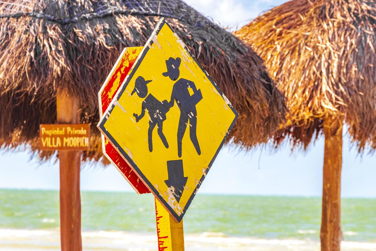 Traffic signs and road signs directional on Holbox island Mexico. photo