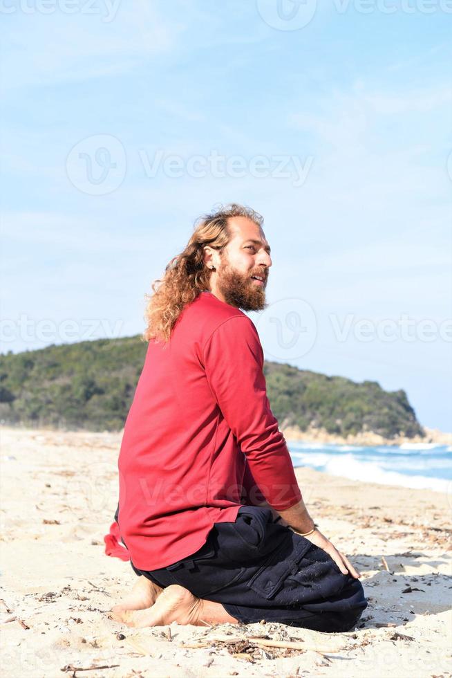 Man relaxing at beach photo