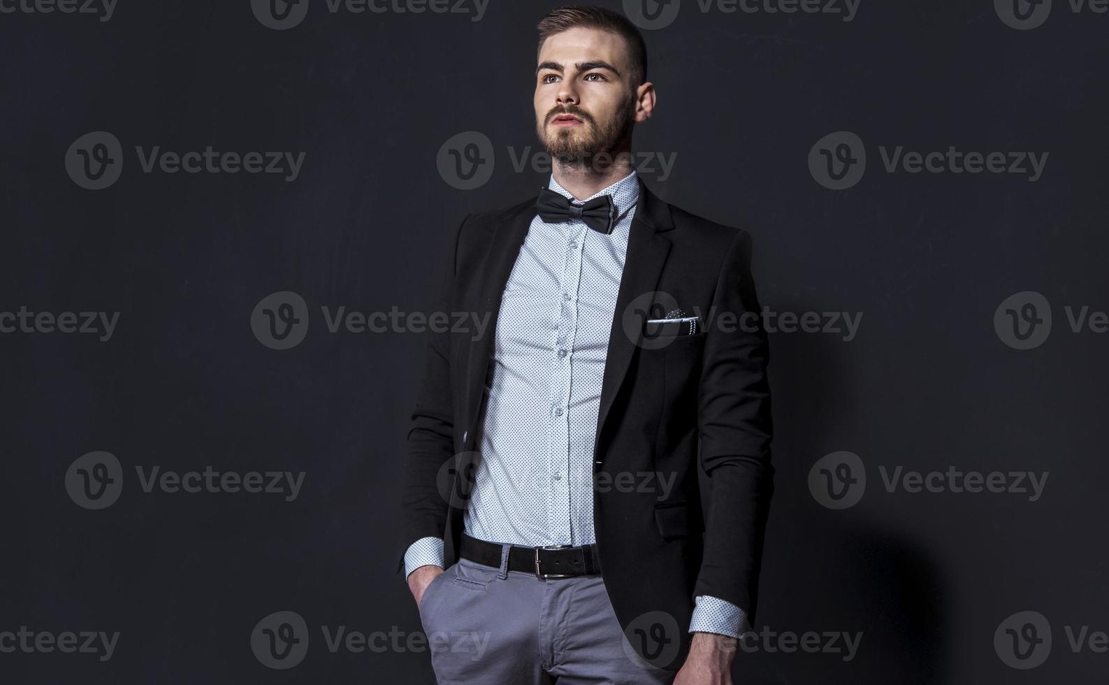 Elegant young handsome man. Studio fashion portrait. photo