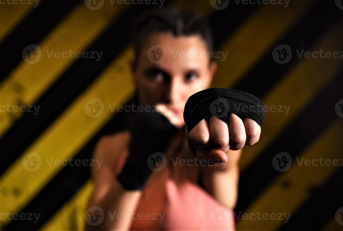 MMA woman fighter tough chick boxer punch pose pretty exercise training cross fit athlete photo