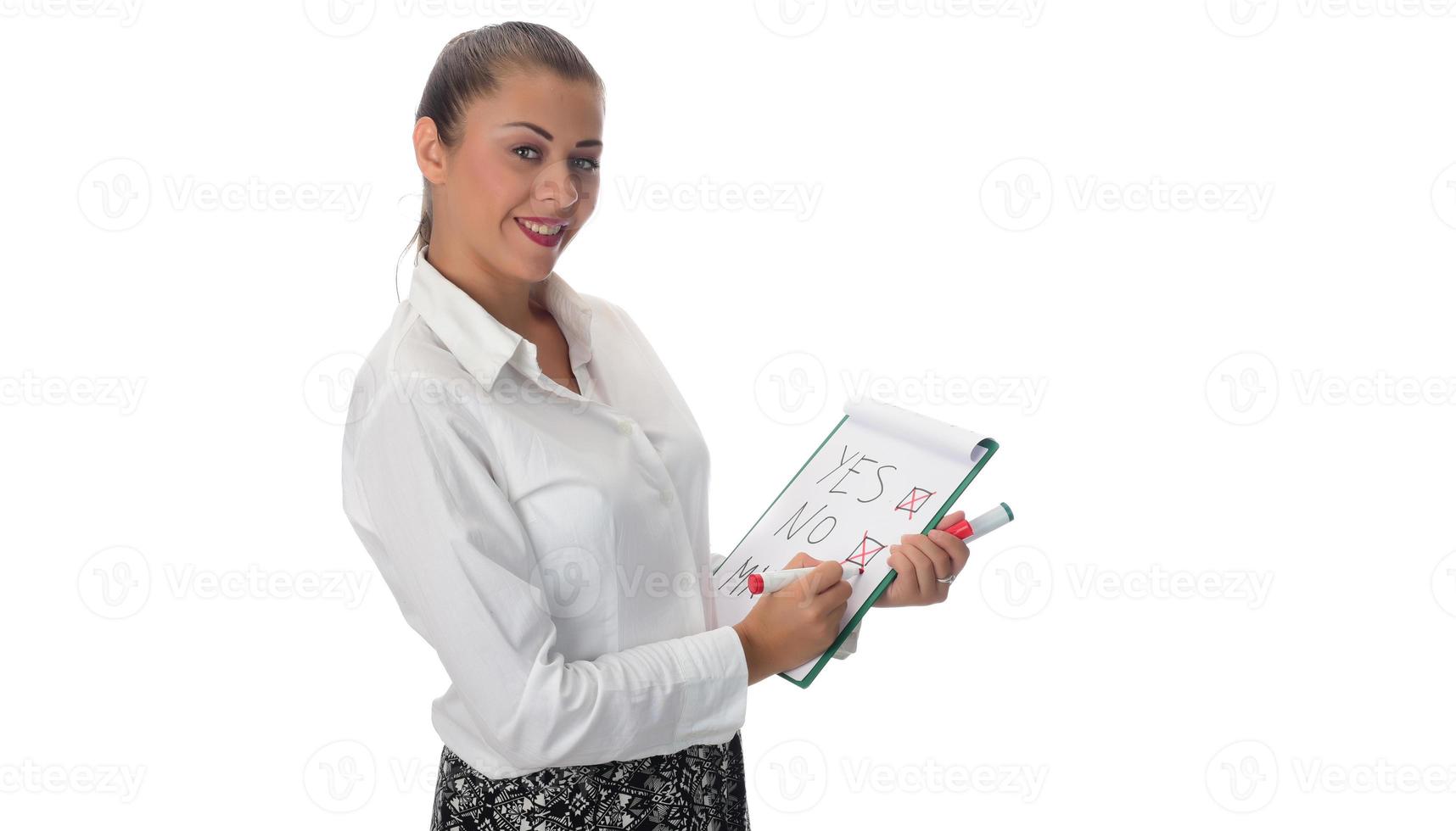 Happy young businesswoman doing business presentation at whiteboard, smiling, isolated on white background. photo