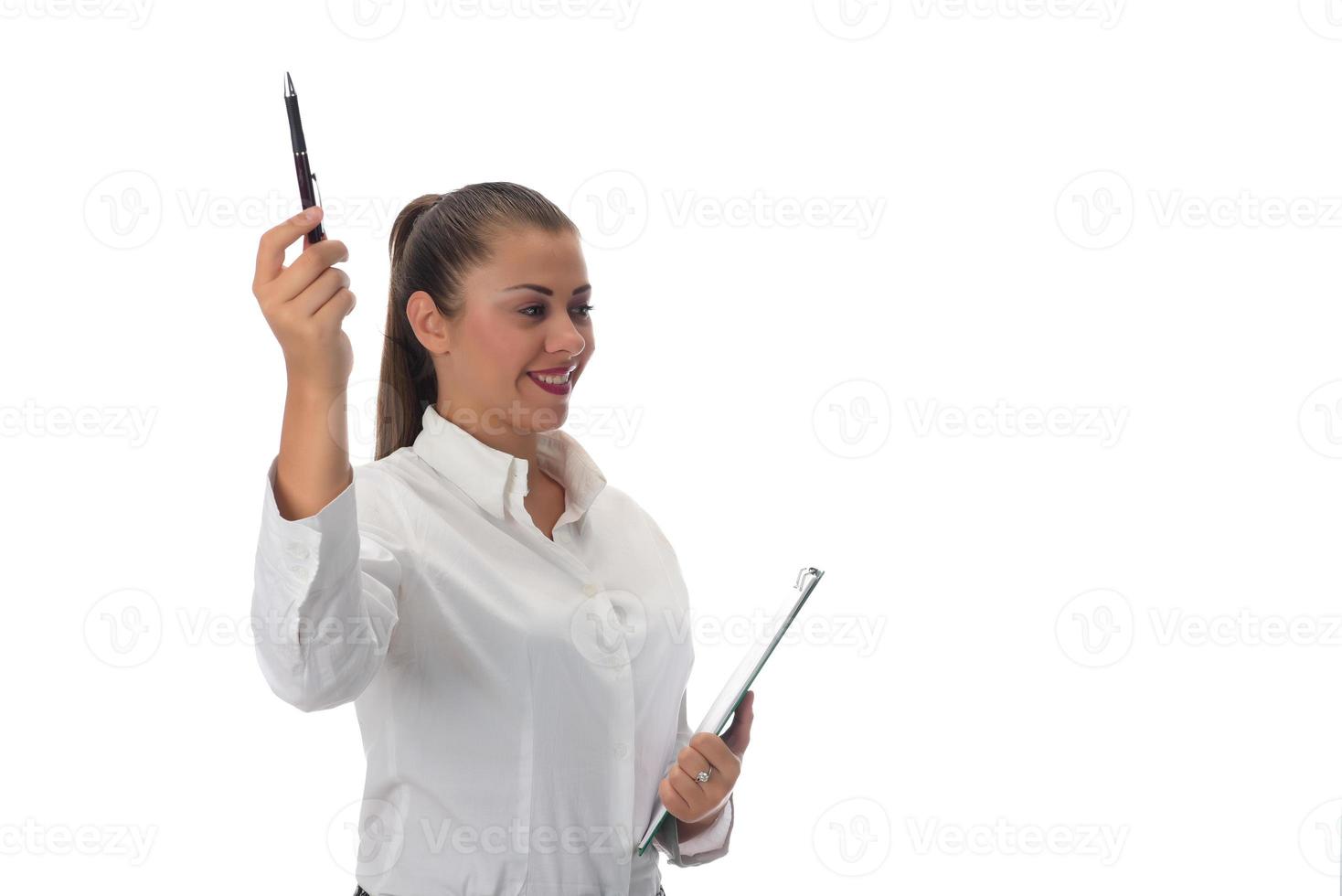 Happy young businesswoman doing business presentation at whiteboard, smiling, isolated on white background. photo