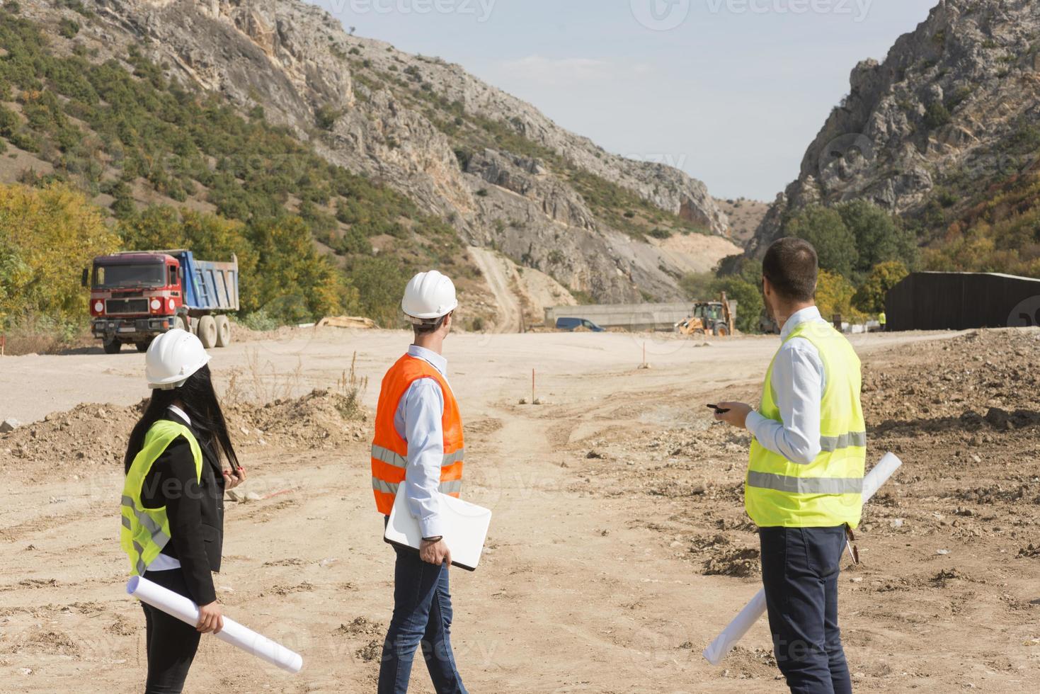 construction workers controlling explosion photo