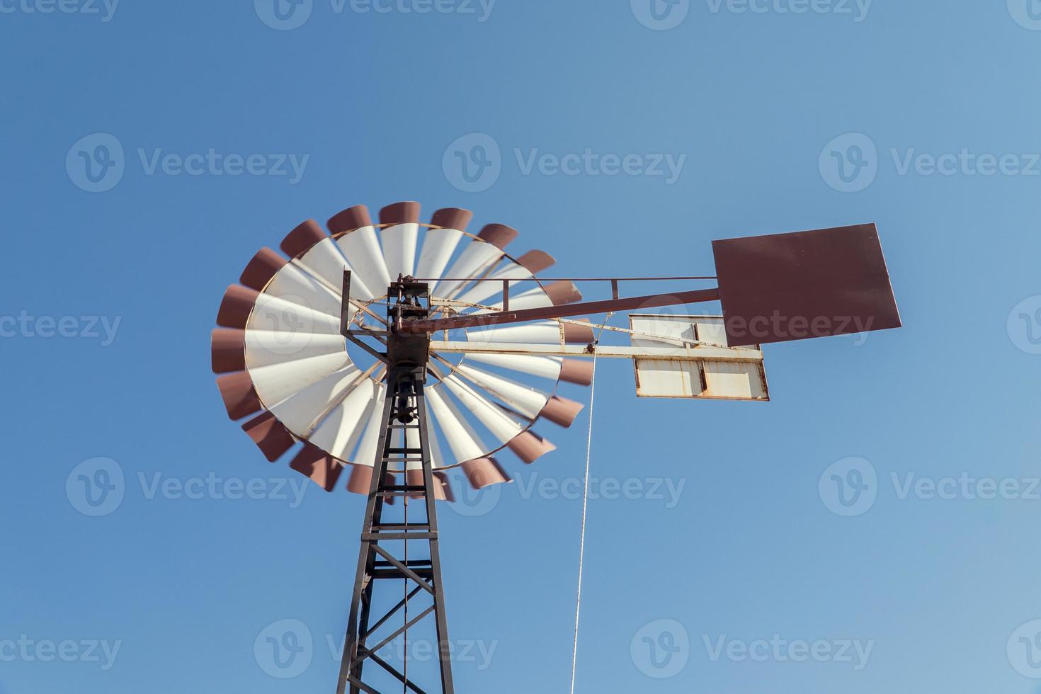 blue sky and wind turbine photo